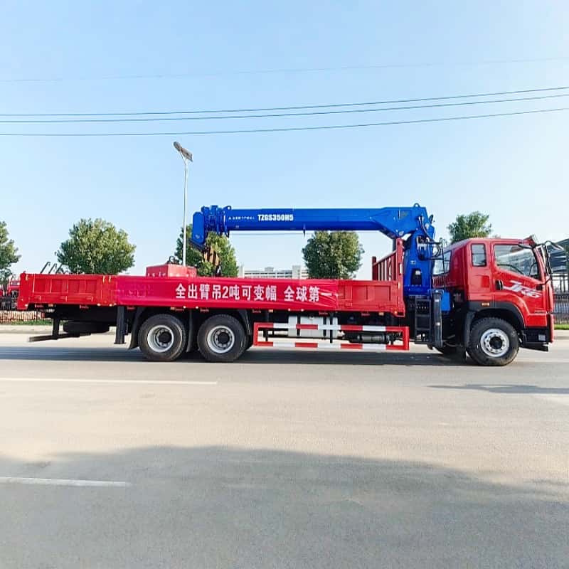 Camión grúa de servicio pesado FAW Jiefang con grúa de pluma rígida XCMG de 14 toneladas.